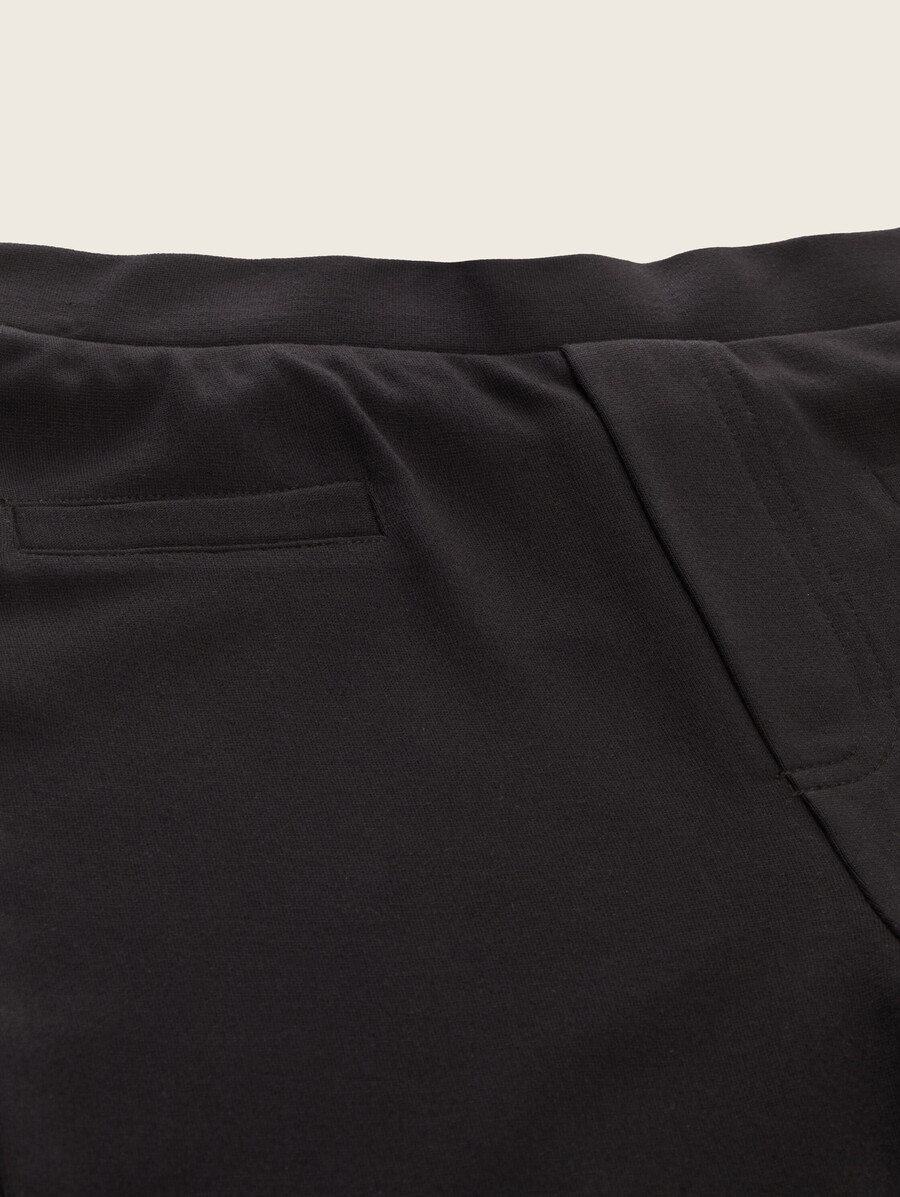 leggings ajustados acampanados con elástico