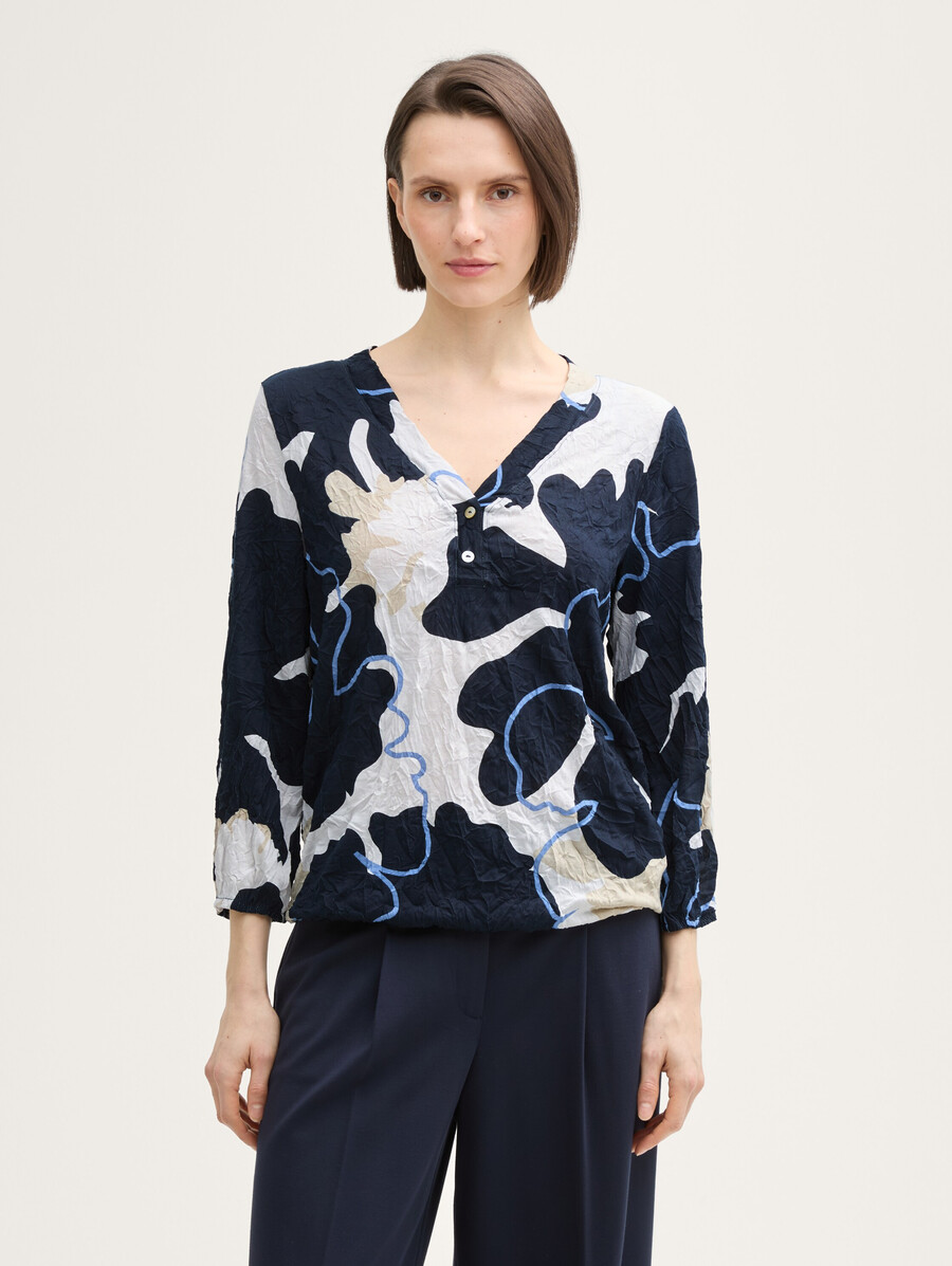 camisa blusa arrugada