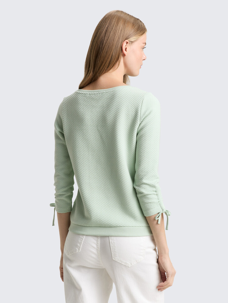 sudadera con mangas fruncidas